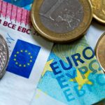 Closeup shot of European union cash, various euro banknotes, and coins