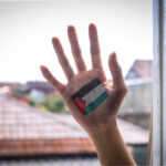 palestine-flag-painted-on-palms-2025-03-14-23-28-55-utc